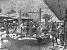 The manners and customs of the Burmans - A wash and brush up in the Market-place... 1886. Creator: Unknown