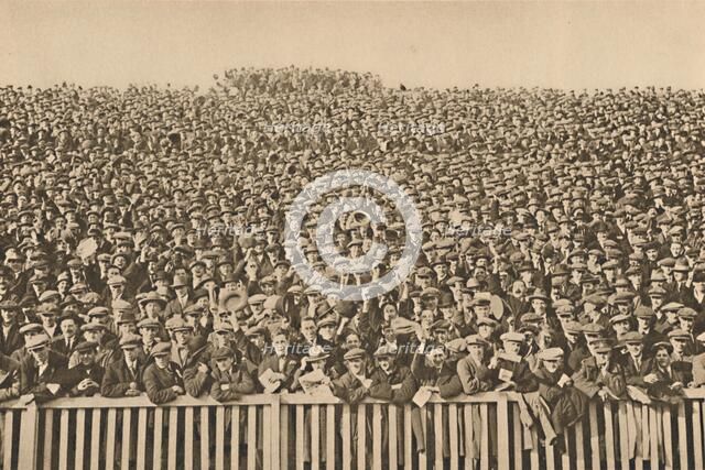 'The Many-Headed Voice Which Roars Behind The Touch-Line Every Winter Saturday', c1935. Creator: Unknown.