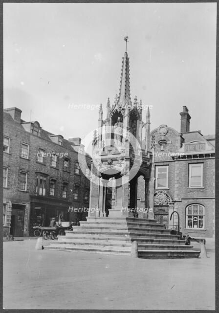 The Market Cross seen from the west, Market Square, Leighton Buzzard, Bedfordshire, 1910-1960. Creator: George R Long.