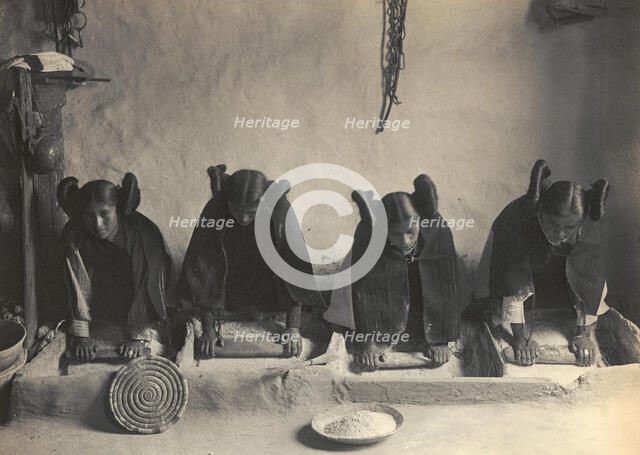 The mealing trough-Hopi, c1906. Creator: Edward Sheriff Curtis.