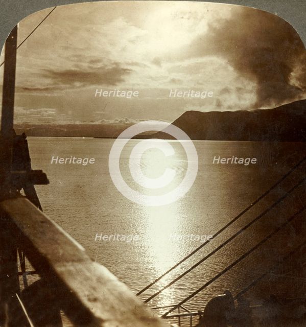 'The Midnight Sun in July over cliffs of Spitzbergen and Arctic Ocean', c1905. Creator: Unknown.