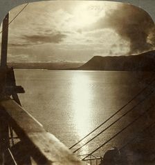 The Midnight Sun in July over cliffs of Spitzbergen and Arctic Ocean c1905. Creator: Unknown