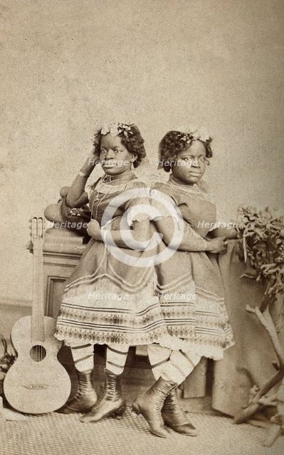 The Millie-Christine sisters, conjoined twins, standing, c1871. Creator: Unknown.