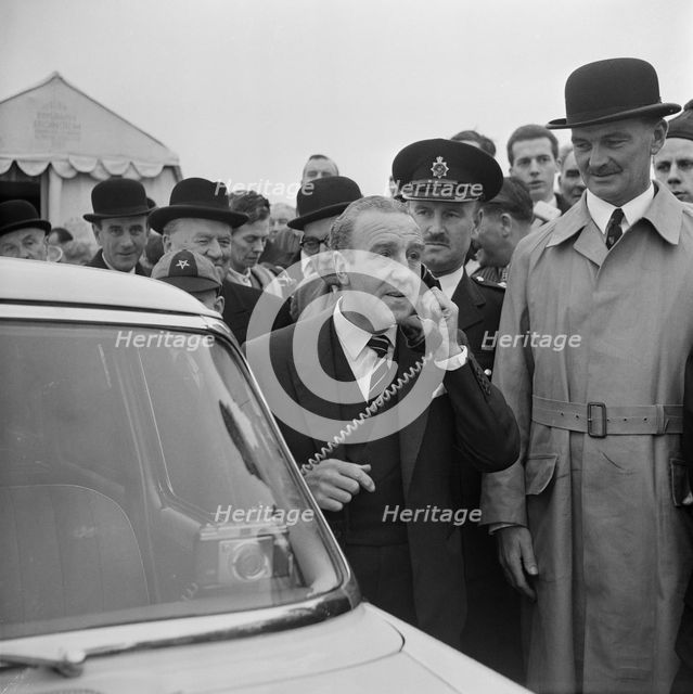 The Minister of Transport, Ernest Marples, using a police car's radio telephone..., M1, 02/11/1959. Creator: John Laing plc.