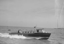 The motor boat Island Enterprise S.I.W. Steam Packet Co., 1933. Creator: Kirk & Sons of Cowes