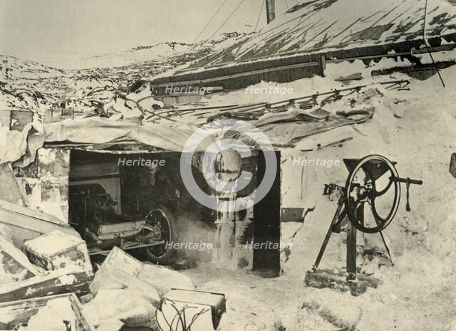 'The Motor Car in the Garage, and Maize-Crusher on the right', c1908, (1909).  Artist: Unknown.