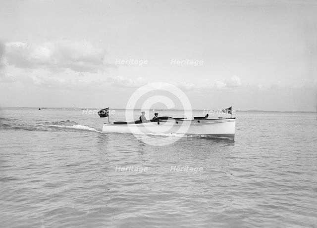 The motor launch 'Wendy' under way, 1913. Creator: Kirk & Sons of Cowes.