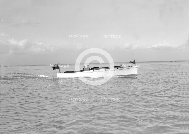 The motor launch 'Wendy' under way, 1913. Creator: Kirk & Sons of Cowes.