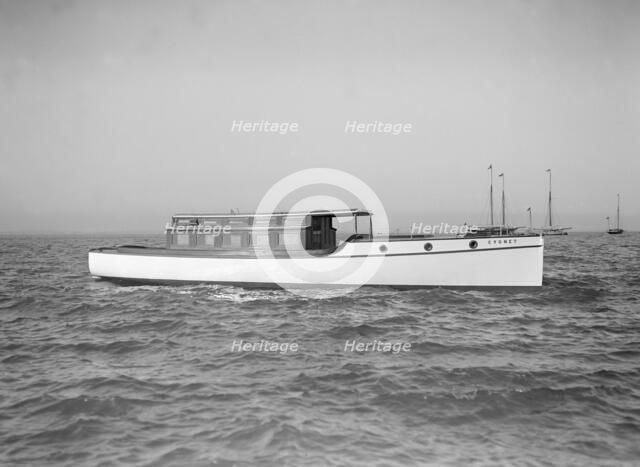 The motor launch 'Cygnet' under way, 1912. Creator: Kirk & Sons of Cowes.