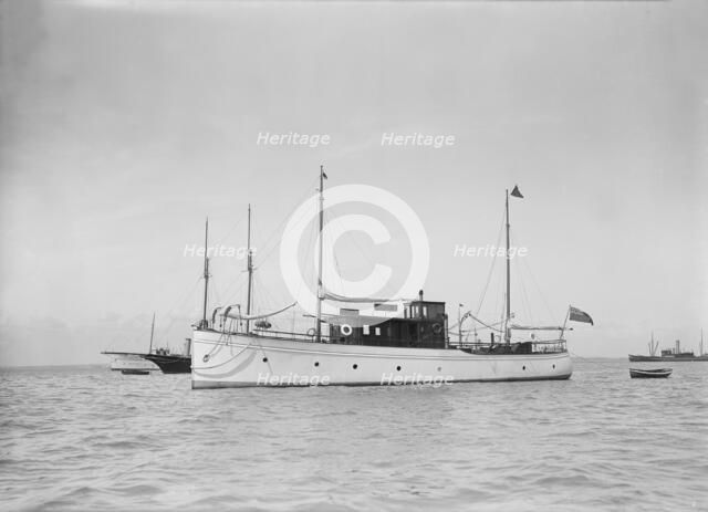 The motor yacht 'Margery' at anchor, 1929. Creator: Kirk & Sons of Cowes.