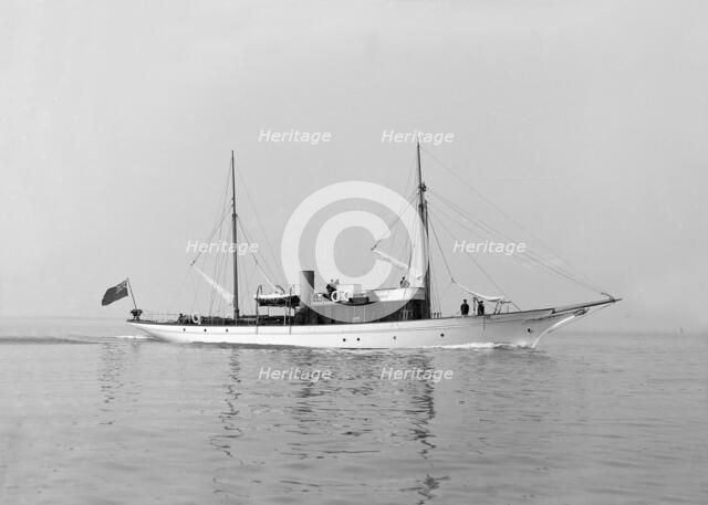 The motor yacht 'Atair' under way, 1914. Creator: Kirk & Sons of Cowes.