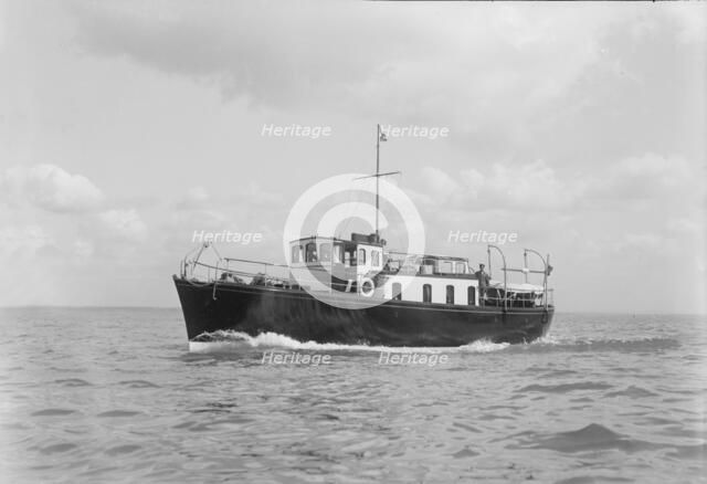 The motor yacht 'Black Arrow' under way, 1934. Creator: Kirk & Sons of Cowes.