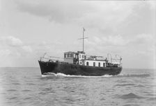 The motor yacht Black Arrow under way, 1934. Creator: Kirk & Sons of Cowes