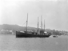 The motor yacht Pleosaurus at anchor, 1922. Creator: Kirk & Sons of Cowes