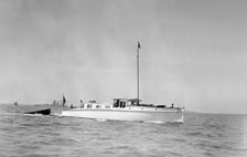 The motor yacht Sygnet under way, 1933. Creator: Kirk & Sons of Cowes