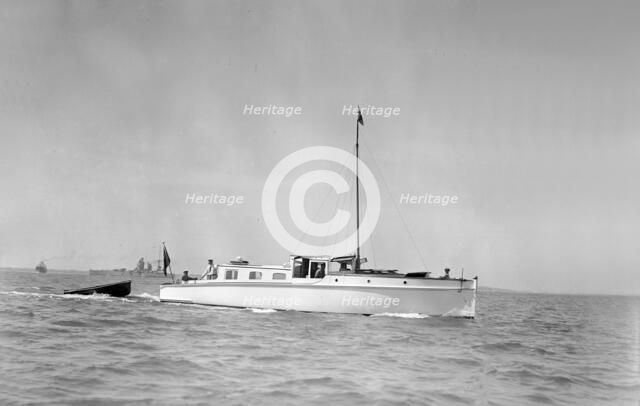 The motor yacht 'Sygnet' under way, 1933. Creator: Kirk & Sons of Cowes.