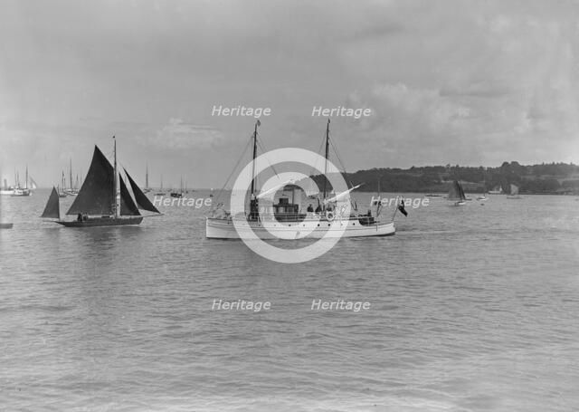 The motor yacht 'Silver Cloud' under way, 1920. Creator: Kirk & Sons of Cowes.
