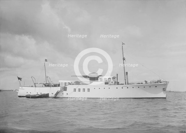 The motor yacht 'Wilma' at anchor, 1936. Creator: Kirk & Sons of Cowes.