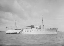 The motor yacht Wilma at anchor, 1936. Creator: Kirk & Sons of Cowes