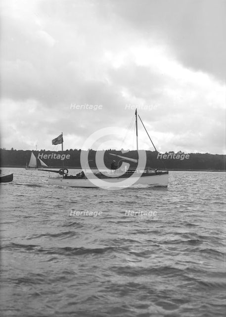 The motorboat 'Maga' under way, 1913. Creator: Kirk & Sons of Cowes.