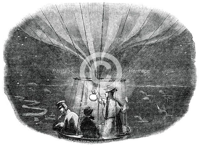 The Nassau balloon passing over Liege at night, 1836, (1886). Artist: Unknown