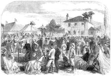 The National Rifle Association prize meeting at Wimbledon: evening band in the volunteer camp, 1865. Creator: Unknown