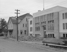 The new WPA courthouse alongside the old county courthouse, Bonners Ferry, Idaho, 1939. Creator: Dorothea Lange