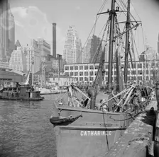 The New England fishing boat, the Catherine C, docked at the Fulton fish market, New York, 1943. Creator: Gordon Parks