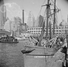 The New England fishing boat, the Catherine C, docked at the Fulton fish market, New York, 1943. Creator: Gordon Parks
