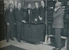 The New Magic: Sending Pictures by Wireless and the Unescapable Telephone c1935. Artist: Keystone View Company