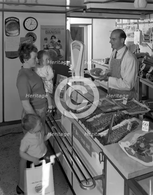 The new metric system of buying food, Stocksbridge, near Sheffield, South Yorkshire, 1966. Creator: Michael Walters.