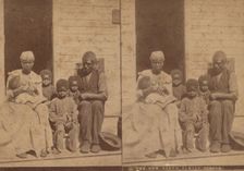 The New South family circle, [Family group on a porch], (1868-1900?). Creator: Unknown