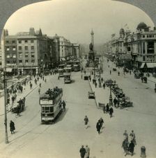 The O'Connell Monument and the Nelson Pillar, O'Connell Street, Dublin, Ireland c1930s. Creator: Unknown