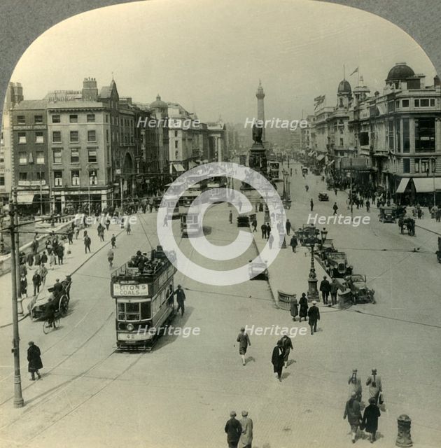 'The O'Connell Monument and the Nelson Pillar, O'Connell Street, Dublin, Ireland', c1930s. Creator: Unknown.