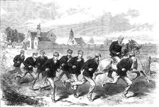 The Oxford and Cambridge Boat-Race: the Cambridge crew training on Barnes-Common, 1868. Creator: Unknown