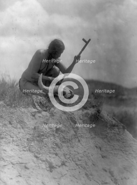 The offering-Hu Kalowa Pi ceremony, 1907, c1907. Creator: Edward Sheriff Curtis.