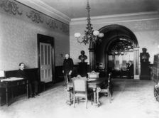 The office lobby in the White House, between 1889 and 1906. Creator: Frances Benjamin Johnston