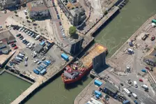 The offshore supply vessel Putford Aries passing through Lowestoft bascule bridge, Suffolk, 2021. Creator: Damian Grady