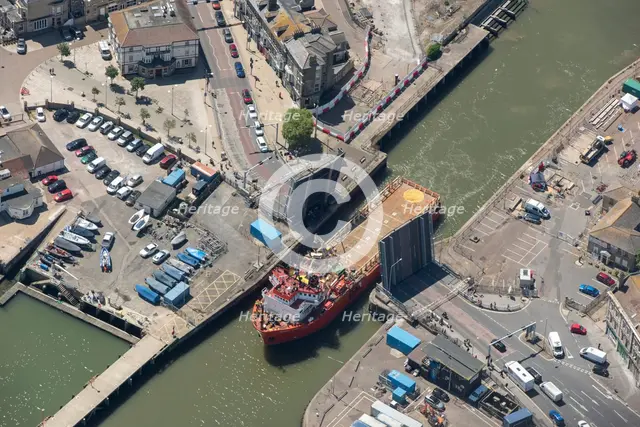 The offshore supply vessel Putford Aries passing through Lowestoft bascule bridge, Suffolk, 2021. Creator: Damian Grady.