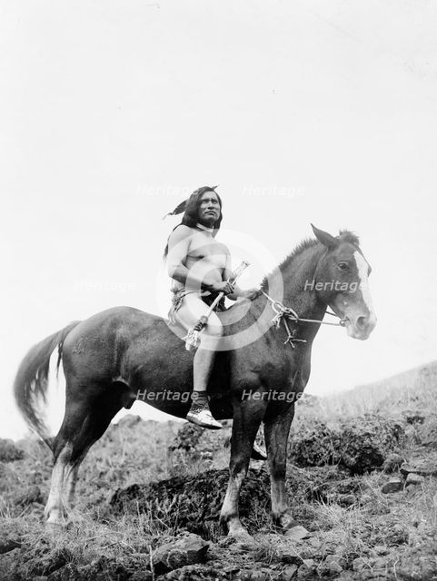 The old-time warrior-Nez Percé, c1910. Creator: Edward Sheriff Curtis.