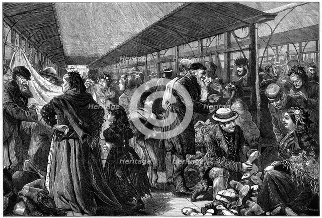 The old clothes exchange, Phil's Building, Houndsditch, London, 1882. Artist: Charles Joseph Staniland