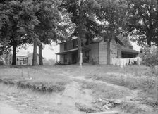 The one-and-a-half story part of this house was built fifty..., Person County, North Carolina, 1939. Creator: Dorothea Lange