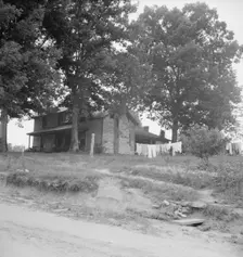 The one-and-a-half story part of this house was..., Person County, North Carolina, 1939. Creator: Dorothea Lange