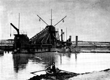 The Opening of the Baltic Canal: a floating dredge employed in deepening the canal, 1895. Creator: Unknown