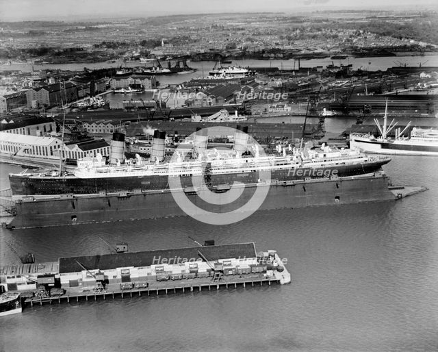 The original RMS 'Mauretania' in the floating dry dock, Southampton, Hampshire, 1933. Artist: Aerofilms.