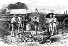 The Autumn Campaign: steam bakery - drawing a batch of loaves, 1872. Creator: Unknown