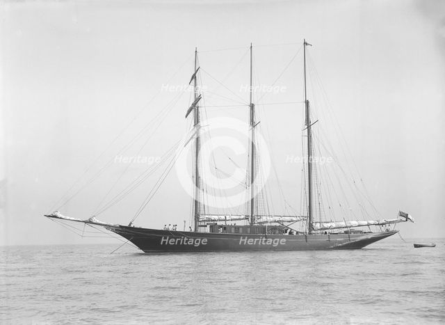 The auxiliary schooner 'La Cigale' at anchor, 1913. Creator: Kirk & Sons of Cowes.