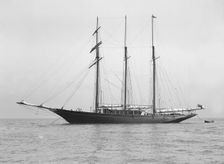The auxiliary schooner La Cigale at anchor, 1913. Creator: Kirk & Sons of Cowes