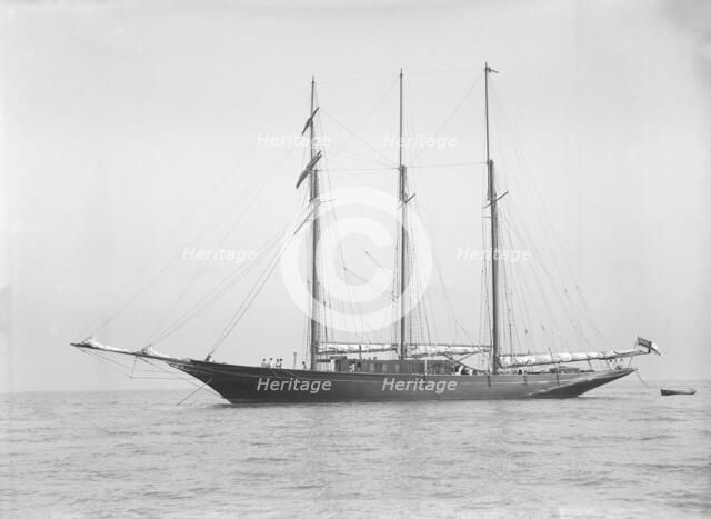 The auxiliary schooner 'La Cigale' at anchor, 1913. Creator: Kirk & Sons of Cowes.