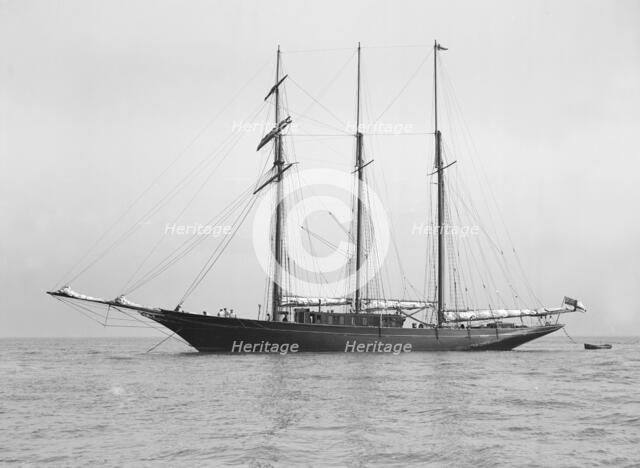 The auxiliary schooner 'La Cigale' at anchor, 1913. Creator: Kirk & Sons of Cowes.